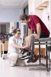 patient with physical therapist
